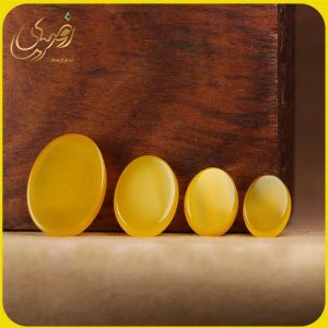 نگین عقیق زرد تک بیضی - جواهری رضوی